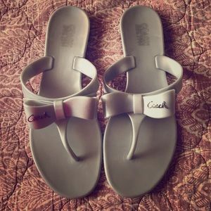 Silver Coach jelly flip flops